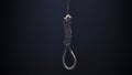 Falling Hangman Noose over black background