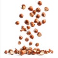 Falling Hazelnuts on White Background Fresh and Delicious Royalty Free Stock Photo