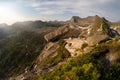 Falling large boulder on the edge of the abyss. Sunset view, Western Sayan. Natural Park Ergaki. Krasnoyarsk region. Russia