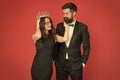 Falling in love with boss. Couple in love red background. Beauty queen and bearded man. Egoistic love. Prom party. Date