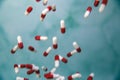 Falling medicine pills defocused blurred background, capsules for Health, Vitamin,drugs concept, copy space modern design