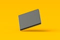 Falling microchip on yellow background. Quantum microprocessor