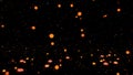 Falling orange fireballs on a dark surface