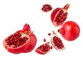 Falling Pomegranate fruit isolated on white background with clipping path, full depth of field. Royalty Free Stock Photo