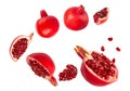 Falling Pomegranate fruit isolated on white background with clipping path, full depth of field. Royalty Free Stock Photo