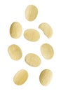 Falling potato chips on white background Royalty Free Stock Photo