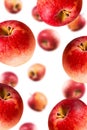 Falling ripe red apples background. Isolated. Close-up. Royalty Free Stock Photo