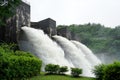 Falling river water in old bricked dam