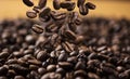 Falling roasted coffee beans on dark background