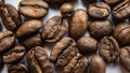 Falling Roasted Coffee Beans, Macro Shot, close-up. Royalty Free Stock Photo