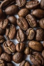 Falling Roasted Coffee Beans, Macro Shot, close-up. Royalty Free Stock Photo