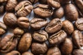 Falling Roasted Coffee Beans, Macro Shot, close-up. Royalty Free Stock Photo