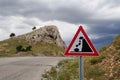 Falling rocks of landslide road sign