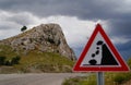 Falling rocks of landslide road sign