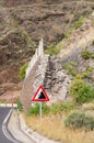 Falling rocks warning road sign Royalty Free Stock Photo