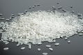 Falling seeds crushed round rice for porridge Royalty Free Stock Photo