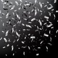 Falling silver confetti on dark background. Vector holiday illustration. Royalty Free Stock Photo