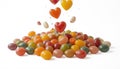 Falling small, colored candies isolated on transparent background. Royalty Free Stock Photo