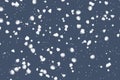 Falling snow against a dark blue sky. Fashionable illustration of the winter night sky.Snow pattern for your postcard design, Royalty Free Stock Photo