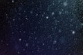 falling snow background, snowflakes against the sky, snowfall in winter Royalty Free Stock Photo