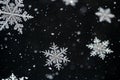 Falling snow on black background Royalty Free Stock Photo