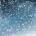 Falling snow on a blue background. Abstract white snowflake and sparkles background. EPS 10 Royalty Free Stock Photo