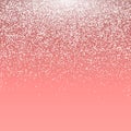 Falling snow on blush pink background. Winter background. Flying snowflakes backdrop. Christmas holiday mood background. New Year Royalty Free Stock Photo