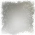 Falling snow flakes on a blurry gray background. EPS 10