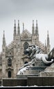 Falling snowflakes at ornate of lion on Piazza del Duomo in Milan, Lombardy, Italy. The Patron Saint of Milan, Madonnina Royalty Free Stock Photo