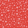 Falling snowflakes on a red background