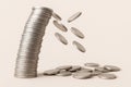 A falling stack of silver coins. Space for text. Royalty Free Stock Photo
