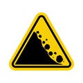 Falling stones sign. Warning road sign falling stones. Yellow triangle sign with a falling stone icon inside. Road sign Caution