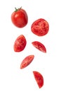 Falling tomato slice isolated on white background with clipping path. Royalty Free Stock Photo