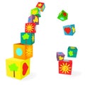 Falling tower of colorful childish play cubes Royalty Free Stock Photo