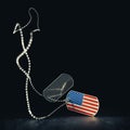 Falling US military soldier`s dog tags in the shape of the American flag with chain. Memorial Day or Veterans Day concept Royalty Free Stock Photo