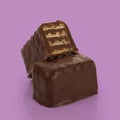 Falling waffle chocolate bars isolated on Pink background Royalty Free Stock Photo