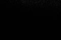 The falling white snow on a black background Royalty Free Stock Photo