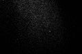 The falling white snow on a black background Royalty Free Stock Photo