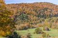 Falls foliage and little hut in Vermont countryside.