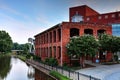 The Old Mill In Falls Park On The Reedy River In Greenville, South Carolina