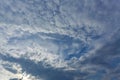 Fallstreak hole cloud on dramatic blue sky Royalty Free Stock Photo