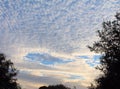 Fallstreak Clouds form as the sun came up