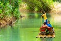 Tourists on bamboo raft ride on Martha Brae River, Jamaica Royalty Free Stock Photo