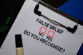 False Belief, Do You Recognize? Yes or No. On office desk background