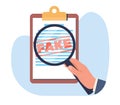 False document, concept of fraud and misreporting. Hand holding magnifying glass, red letters fake. Media illegal Royalty Free Stock Photo