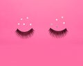 False eyelashes and sparkles on pink background Royalty Free Stock Photo