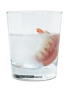 False teeth in cleaning water glass