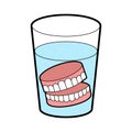 False teeth in glass. False jaw in glass beaker Royalty Free Stock Photo