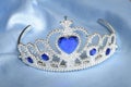 False tiara with diamonds and blue gem Royalty Free Stock Photo