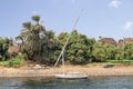 Faluca boat moored in Nile river at Aswan, Egypt Royalty Free Stock Photo